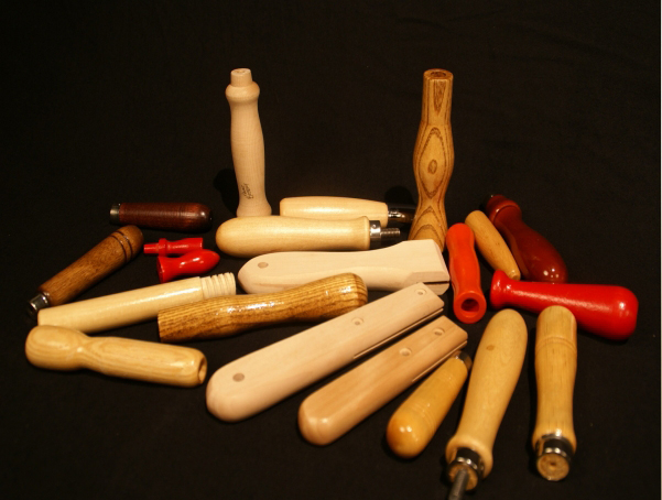 Collection of small-sized custom wooden handles. Some have ends shown with various secondary operations and they all are finished in different colors, stain or clear finishes.
